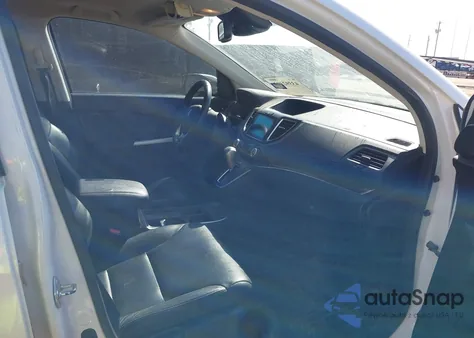 2015 Honda Cr-V Touring z USA, uszkodzony, nr VIN 5J6RM3H94FL021628